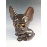 A novelty Art Deco carved wood dog clock with rolling eyes which indicate the time, collar a/f