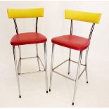A pair of 1950's vintage chrome and vinyl bar chairs