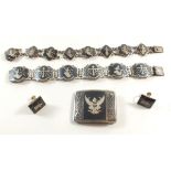 A collection of Siam silver jewellery to include two bracelets, one a/f, a buckle and screw back