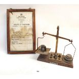 A set of Post Office scales and a Harrow Post Office 'Hours of Business' sign