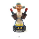 A 'De Kuyper' vintage plastic Cherry Brandy bar advertising figure of a Dutch girl, 23cm tall