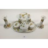 A Limoges dressing table set, printed apples