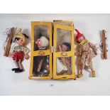 Two Pelham puppets boxed and a clown and Pinocchio puppet - not boxed