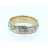 A 9 carat white and yellow gold eternity ring set chip diamonds, 3.7g, size L