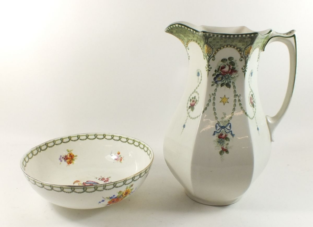 A Royal Doulton fruit bowl painted reserves of flowers and exotic birds together with an Edwardian