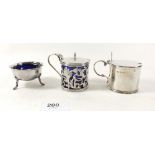Two silver mustard pots, a silver salt with liner and a silver pepper pot with liner, silver