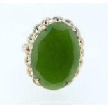 A 14 carat gold ring set oval green stone, size N