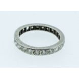 A full eternity ring set with round brilliant cut diamonds (ring has some diamonds missing) size H-I