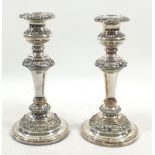 A pair of Victorian silver plated candlesticks, 20cm