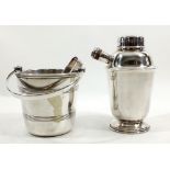 A silver plated cocktail shaker and ice bucket with tongs