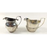 Two silver cream jugs, Birmingham 1906 and Chester (date mark rubbed), 113g