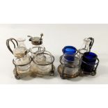 A pair of glass and silver mounted small cruet stands - one complete and other incomplete