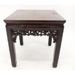An antique Chinese rosewood occasional table with carved fretwork apron, signed to base, 49 x 49cm