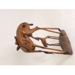 An African large carved wood antelope with foal, 90cm tall