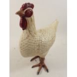 A cast iron painted chicken, 32cm high