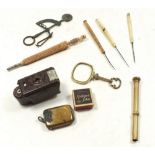 A box of various collectables including scales, extending pencil, magnifying glass, Midget camera