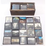 A box of miscellaneous magic lantern slides, themes include UK topography, foreign views, coloured