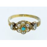 A Victorian gold turquoise and seed pearl flower form cluster ring set two old cut diamonds to