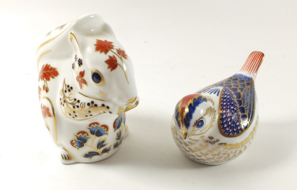 A group of two Royal Crown Derby Imari paperweights in the form of a squirrel and goldcrest (