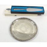 A silver handled cake knife and a silver plated dish, marked 142 JAYS 144, Oxford St. W