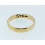 A 9 carat gold wedding band, size L to M, 1966 1.2g