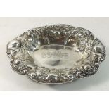 An American sterling silver floral embossed dish by R Wallace and Sons, 100g