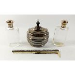 A silver tea caddy, 186g, two silver topped toiletry jars and a comb a/f