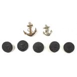 A small group of navy related buttons, cap badge etc.