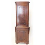 A reproduction mahogany corner cupboard, 182cm tall