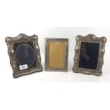 Two silver photograph frames, Sheffield 1989 and 1994, 20 x 15cm together with another photograph