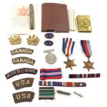 A set of WWII medals to John Down No 11418650 comprising War Medal France and Germany Star and 39.45