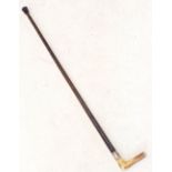 A horn handled and leather clad walking stick with silver plated collar