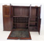 An Edwardian unusual mahogany postal cabinet (the top part only) with an arrangement of doors and