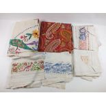 A small group of oriental embroidered linen