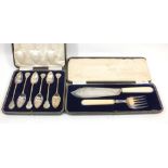 A set of silver fish servers, Sheffield 1904 and a set of silver plated teaspoons both boxed