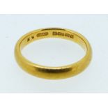 A 9 carat gold wedding band, size M-N, 5.4g