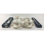 An Aynsley 'Grotto Rose' bachelor tea set and a Royal Worcester cake slice and knife, boxed