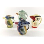 Four vintage bird form novelty jugs