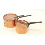 Two Victorian copper large saucepans and lids, largest 27cm diameter