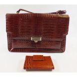 A snakeskin handbag and purse