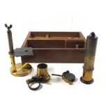 An Edwardian brass field microscope in mahogany fitted box
