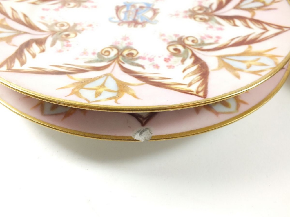 A set of nine 19th century tea plates painted in pink and gilt with monogram to centre - Image 2 of 2