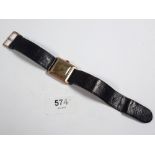 A 9ct gold vintage gentleman's wrist watch with leather strap