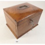 A Victorian walnut ladies work box with fitted interior and watch holder to drawer