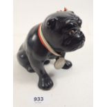 A vintage black plaster bull dog with Crystal Palace Medal