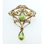 A 9ct gold Edwardian Art Nouveau seed pearl and peridot pendant, 3.8g, 4cm long