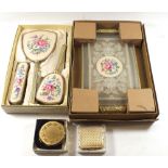 A vintage dressing table brush and mirror set on tray - boxed as new and two compacts, boxed