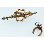 An Edwardian 9 carat gold brooch set pearls and rubies, 1.5g - cased and a 9 carat gold horseshoe