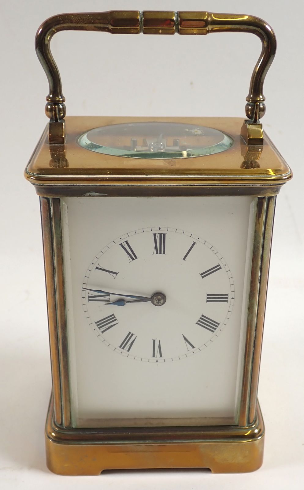 A 19th century brass striking carriage clock with key, 17.5cm tall