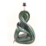 A lustred green pottery 'twisted' table lamp, 30cm